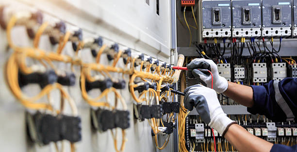 Professional Electrician technician working in Warren, IN